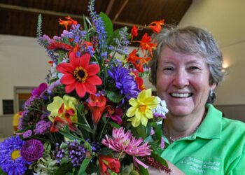 Hurst Horticultural Show

Sheila Whittaker with her prizewinning entry in the "Riot in Colour" class.