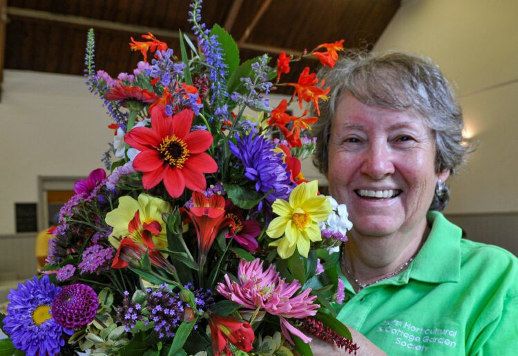 Hurst Horticultural Show

Sheila Whittaker with her prizewinning entry in the "Riot in Colour" class.