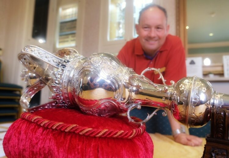 Mayor's attendant David Dunham with the mace that dates back to 1758.