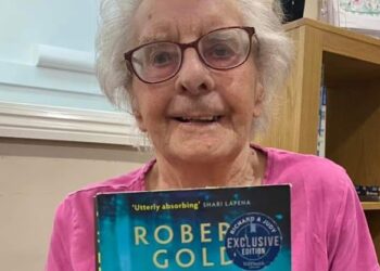 Austen House staff and residents shared their favourite reads on Book Lovers Day. Picture: Austen House care home