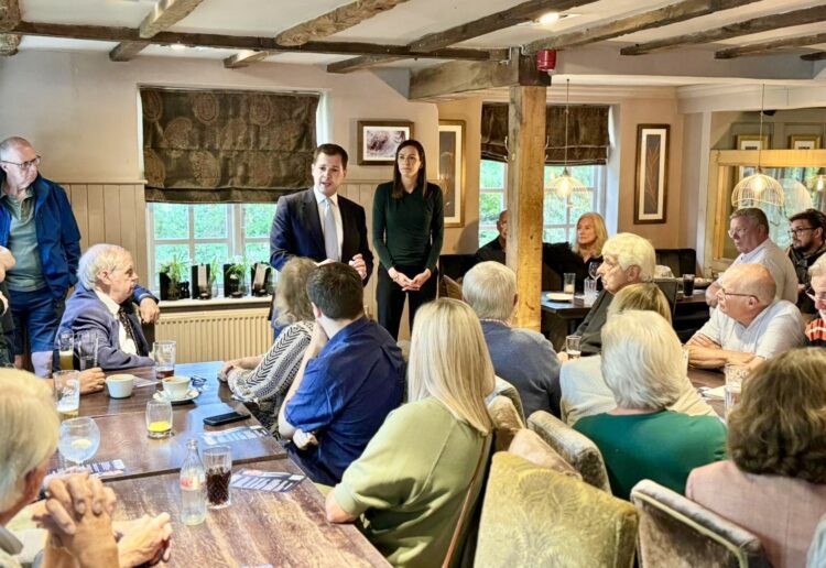 Robert Jenrick, MP, with Lucy Demery and Conservative party members.