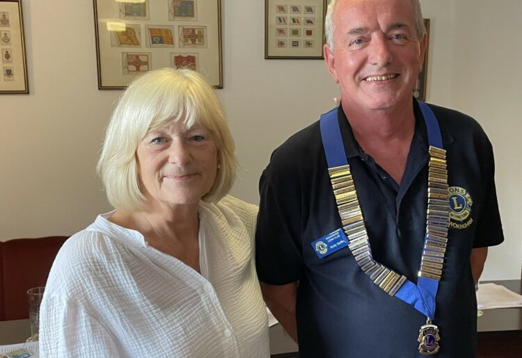 Outgoing incumbent Lyn Baily with new Wokingham Lions Club president Andy Goffin at a handover ceremony. Picture: Wokingham Lions Club