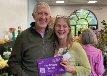 WHA chair Lindsey Payne and George Spence celebrate the arrival of the Chatty Bench plaque. Picture: Emma Merchant