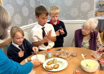 Murdoch House-Pupils from St Teresa's with residents at Murdoch House Care Home. Picture: Murdoch House