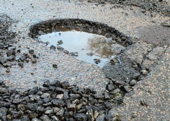 A pothole that appeared in Colemansmoor Lane in Woodley overnight on Friday, January 5 Picture: Phil Creighton