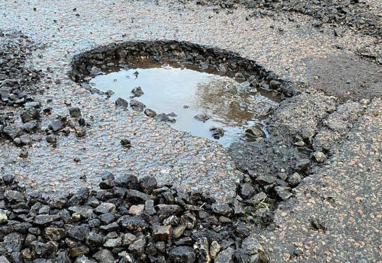 A pothole that appeared in Colemansmoor Lane in Woodley overnight on Friday, January 5 Picture: Phil Creighton