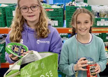 Pupils from Dolphin School, Hurst rolled up their sleeves to help at Wokingham Foodbank. Picture: Emma Merchant