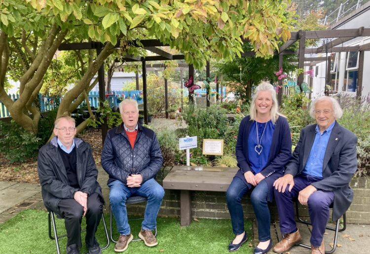 Wokingham Hospital's Sensory Garden, conceived by Wokingham In Need, received an award from Squire's Wokingham. Seated; assistant centre manager Ben, David Lee, Jo Langdon, and Peter Izod. Picture: Emma Merchant