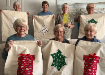 Members of The Inner Wheel Club of Reading Maiden Erlegh with the Christmas sacks for children in the borough that they have made for The Cowshed. Picture: TIWCRME