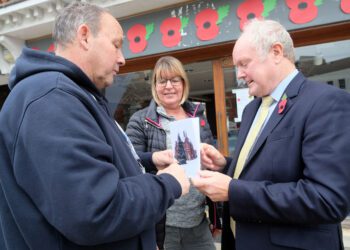 Clive Jones (right) visited the poppy appeal pop-up shop. Pic: Andrew Batt.
