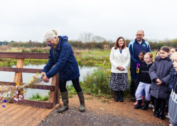 Professor Helen Bilton officially opens the meadow classroom at Shinfield St Mary's. Picture: The University of Reading