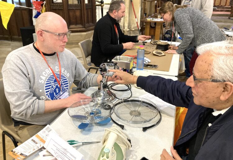 A volunteer fixer repairs a broken fan at a Wokingham Repair Cafe session. The group meets on the second Saturday of the month. Picture: Emma Merchant