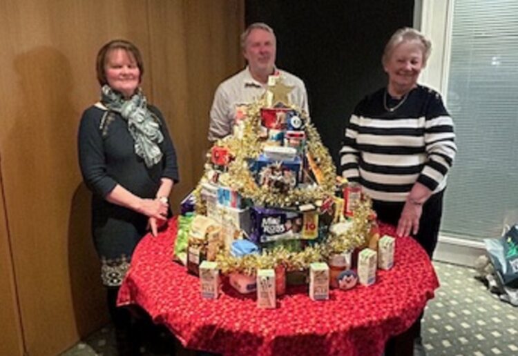 Members of The Inner Wheel club of Reading Maiden Erlegh decorated their food donations with tinsel and a star. Picture:Inner Wheel club of Reading Maiden Erlegh