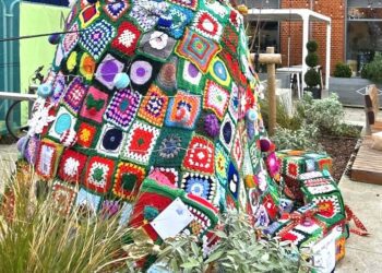 Borough crafters the Barkham Hookers have crocheted a Christmas tree in Peach Place. Picture: Gaynor White