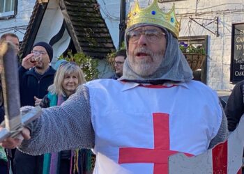 Yateley Morris Men performing a Mummers play in the car park of The Queen's Oak in Finchampstead on Boxing Day