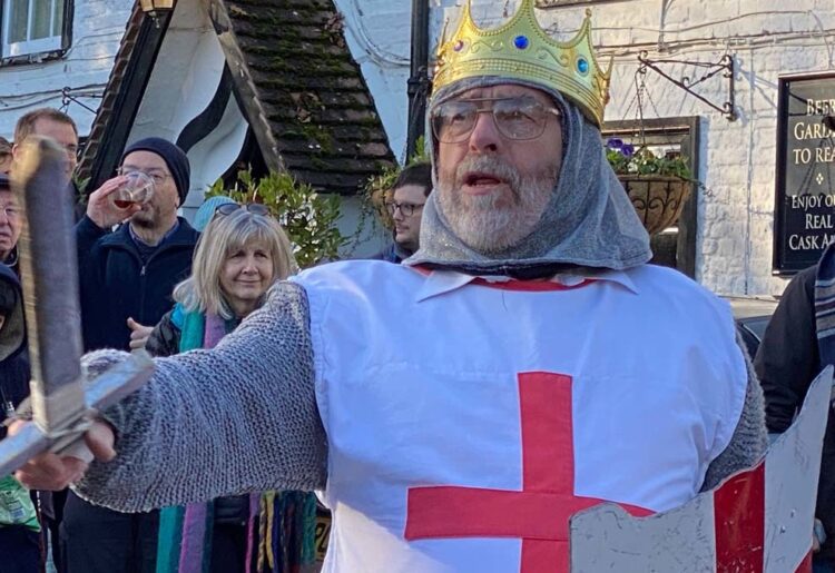 Yateley Morris Men performing a Mummers play in the car park of The Queen's Oak in Finchampstead on Boxing Day