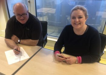 Bruce Winton, chief executive and clerk to Shinfield Parish Council, and Charlotte Haitham Taylor, chair of Arts4Wokingham, signed an agreement for A4W to advise and consult on selecting and installing a new piece of public art. Picture; A4W