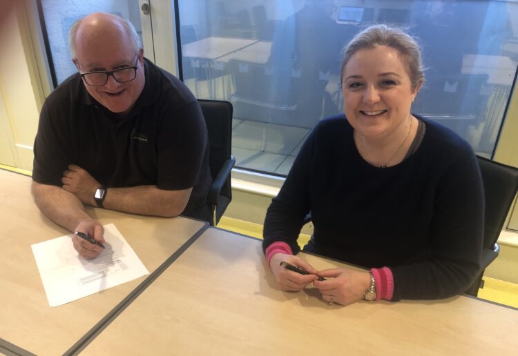 Bruce Winton, chief executive and clerk to Shinfield Parish Council, and Charlotte Haitham Taylor, chair of Arts4Wokingham, signed an agreement for A4W to advise and consult on selecting and installing a new piece of public art. Picture; A4W