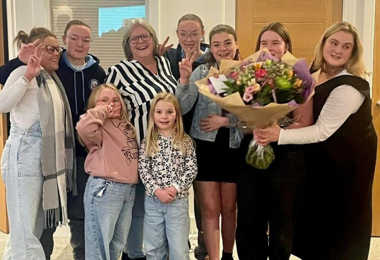 Bernie, surrounded by her two daughters and six grandchildren. Picture: Courtesy of COATS Day Centre