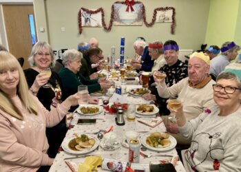 Westende Almshouses residents, staff and trustees gathered for a very jolly Christmas lunch. Picture: Emma Merchant