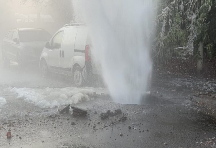 Residents of Luckley Road were shocked to find a 30' jet of water in the street, the result of a burst water main. Pictures courtesy of residents.