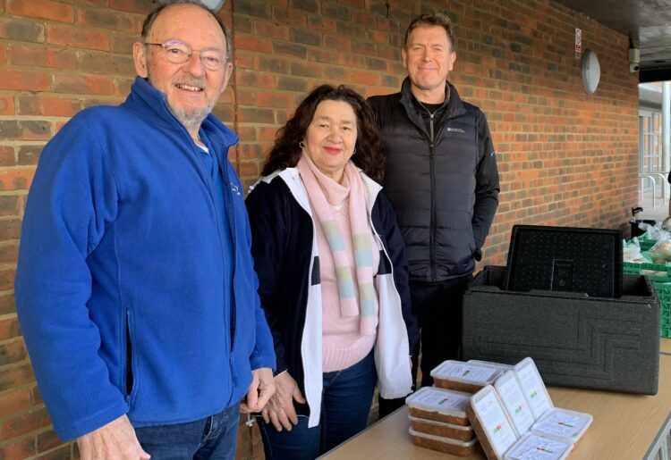 Scott Trathen (left) from the Rotary Club of Maiden Erlegh delivers food containers to Finchampstead Baptist Church. Picture: RME