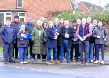 Penny Mourdant and Nick Kilby (centre) with other Conservative supporters in Winnersh on Saturday. Pic: Andrew Batt.