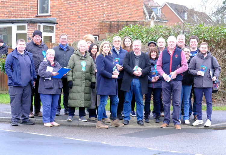 Penny Mourdant and Nick Kilby (centre) with other Conservative supporters in Winnersh on Saturday. Pic: Andrew Batt.