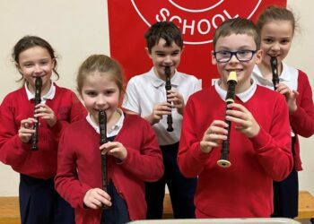 Pupils from Hatch Ride with their recorders.