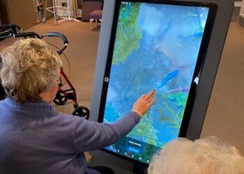 Residents of West Oak Care Home are enjoying using a new Digital Rainbow Table. Picture: West Oak Care Home