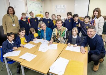 Pupils from Bearwood primary school with poet Toby Thompson and councillors Bray and Ashwell.Pic: Stewart Turkington.
