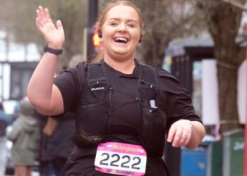 Wokingham's David Cliff Half Marathon brought smiles, and many pairs of running shoes, to the town. Picture: Andrew Batt