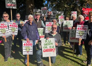SOLVE Hall Farm were at the university on Saturday, October 8, protesting plans to build 4,500 houses at Hall Farm. Picture: Ji-Min Lee