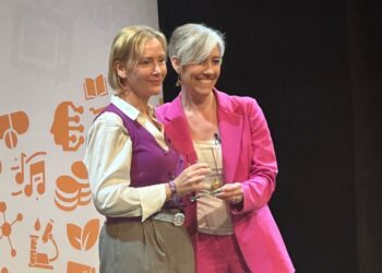 Louise Timlin (left) receiving an award.
