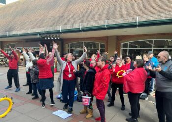 Members of CLASP Wokingham choir sang for shoppers outside Wokingham Waitrose on Friday for Comic Relief. PIcture: CLASP Wokingham