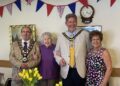 Earley Town Mayor Cllr Mike Smith, and one of the day centre's longest standing members Mrs. Janette Rollinson, with Mayor of Wokingham Borough Cllr Adrian Mather, and chair Mrs. Linda Chambers celebrated Earley Day Centre's 50th year at a tea party for its members. Picture: Earley Day Centre
