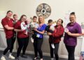 Team members and children at Partou Children?s House in Binfield celebrating their Ofsted report which rated the nursery ?Good? in all areas