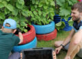 Beans get a compost treat at Gardening Club. Picture courtesy of CLASP Wokingham