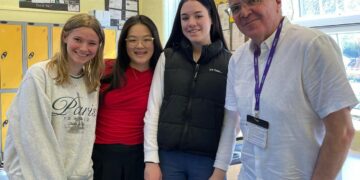 Andrew with members of the journalism club at Kendrick school.