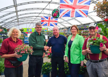 Graham Fitsell, Squire?s Hare Hatch centre manager (second from left) with Alan Boyle, Age Concern Twyford & District centre manager (centre), Tina Goodwin, trustee at the charity (second from right) and members of the garden centre plant team. Picture: Squire's Hare Hatch