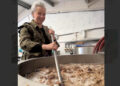 Claire Revie, founder of SHARE Wokingham, helps to create the new brew.