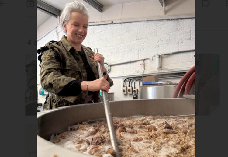 Claire Revie, founder of SHARE Wokingham, helps to create the new brew.