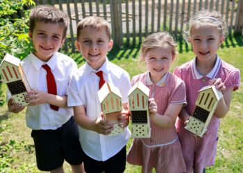 Pupils with the new bee hotels.