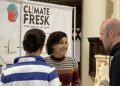 Interactive games hosted by Climate Fresk will offer a fun way to better understand climate change and biodiversity. Here Elizabeth Corse explains the games to visitors. Picture: Emma Merchant