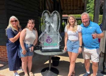 New Life, which raises money to fund equipment for NHS hospitals and their special care baby units, is celebrating its 30th year. Picture: Trevor Goodall with daughters Hannah and Isabel plus former wife Tanya.