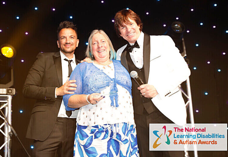 Sarah being presented her award by Peter Andre and host and compere Steve Walls. Picture courtesy of Hightown Housing Association