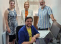 Town mayor, Cllr Lou Timlin (centre, back) with graphic designer Charlotte Simpson (left), and reporters Andrew Batt (right) and Jake Clothier (seated).
