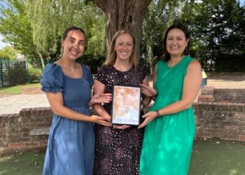 Mrs Connelly, PE lead, Mrs Appleby, Headteacher, and Mrs Somerville, PE lead proudly displayed the award won by Keep Hatch Primary School