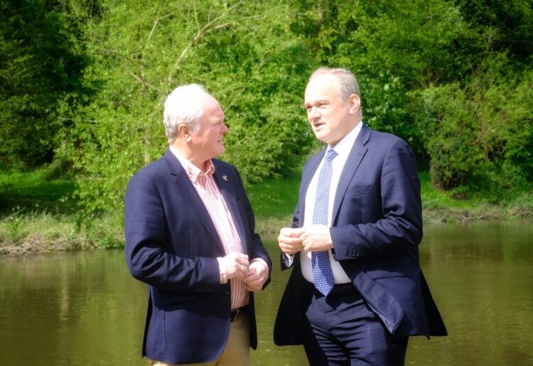 Sir Ed Davey (right) with Clive Jones.