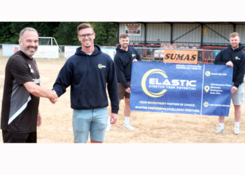 Matt Eggleston (left), commercial manager and joint-manager, with Sean Moore and staff from Elastic. Pic: Andrew Batt.